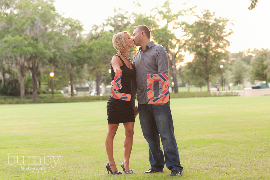 engagement couple holding initials