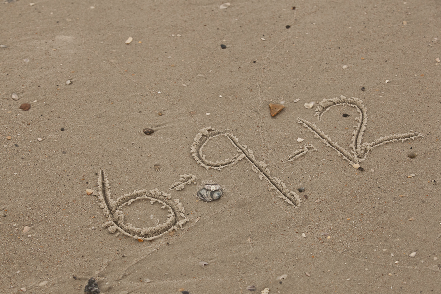 engagement date written in sand