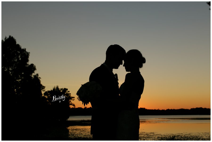 sunset silhouette photo at lake mary event center