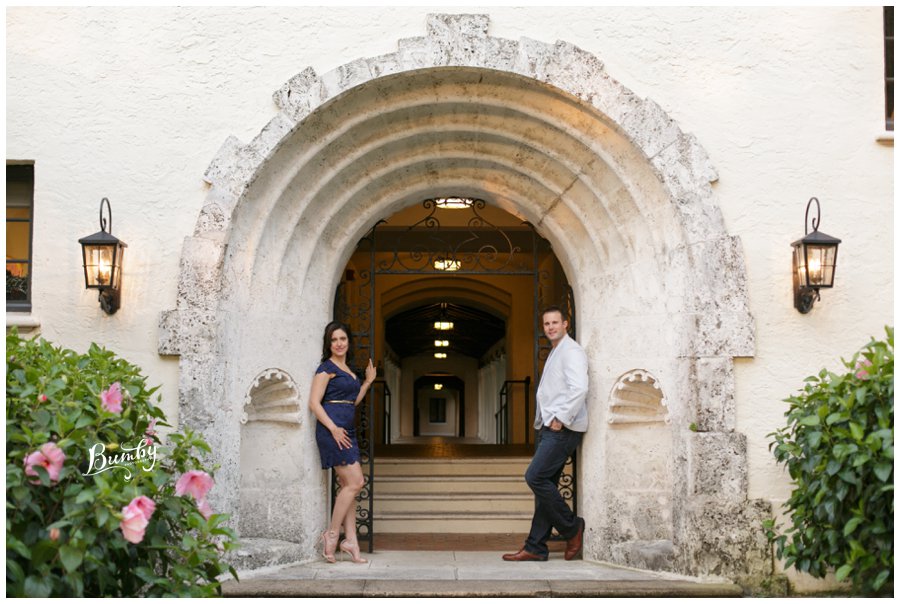 Couple standing outside of an old Winter Park building.
