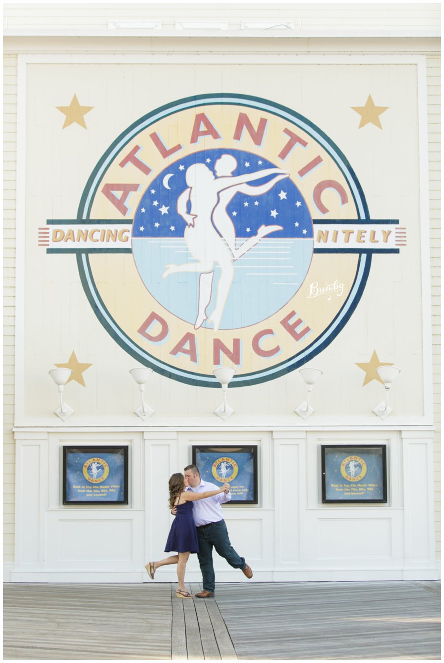 Couple dancing on the Disney boardwalk.