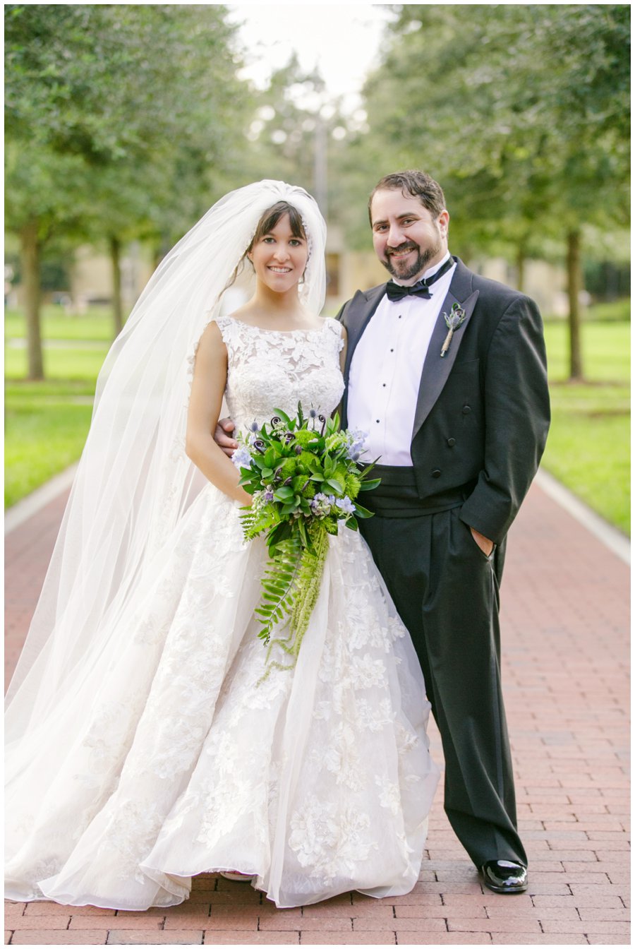 bride and groom on brick road at Rollins College