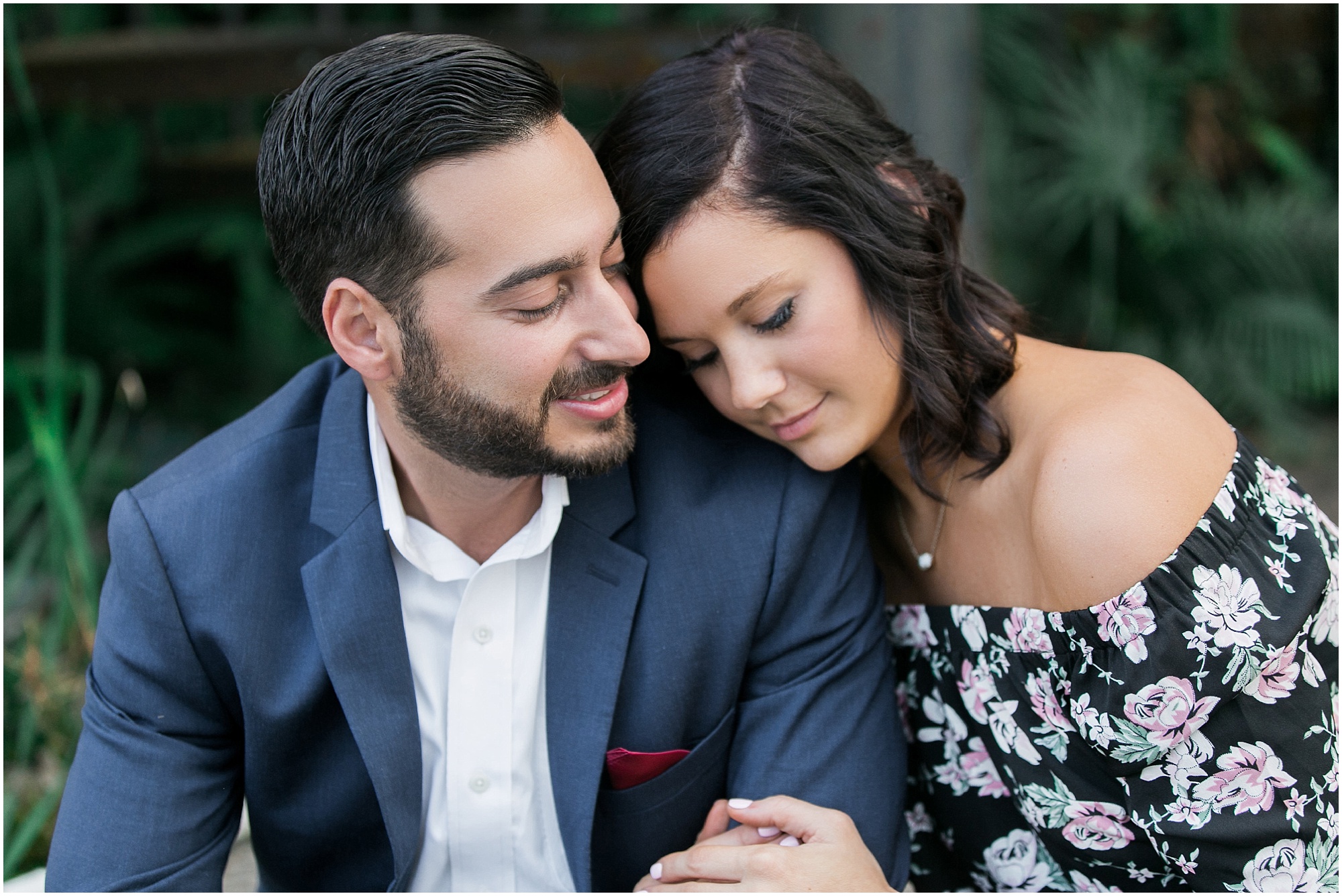 girl laying on her fiances shoulder during sweet historic engagement session