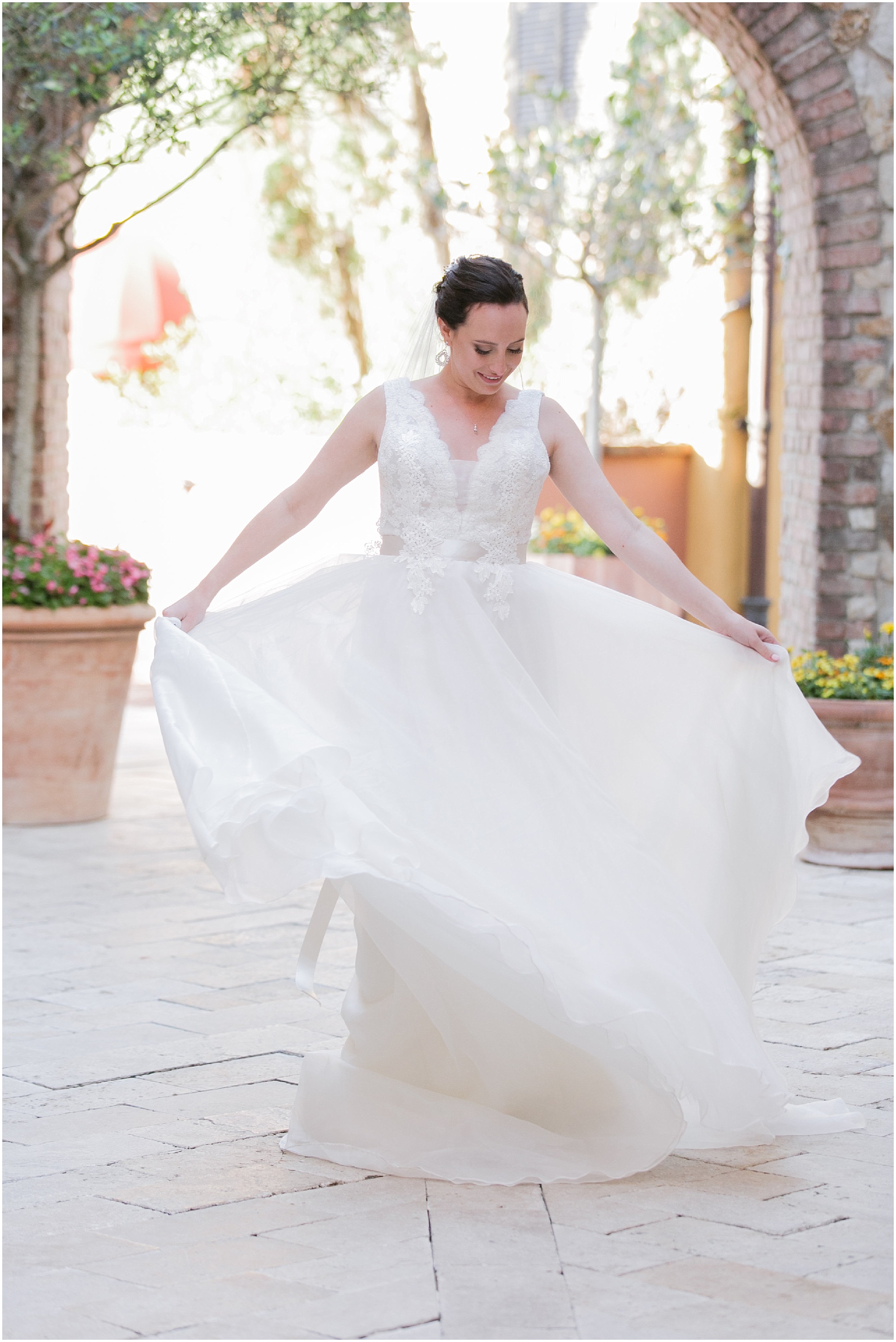 Bella Collina bride dancing in her wedding dress