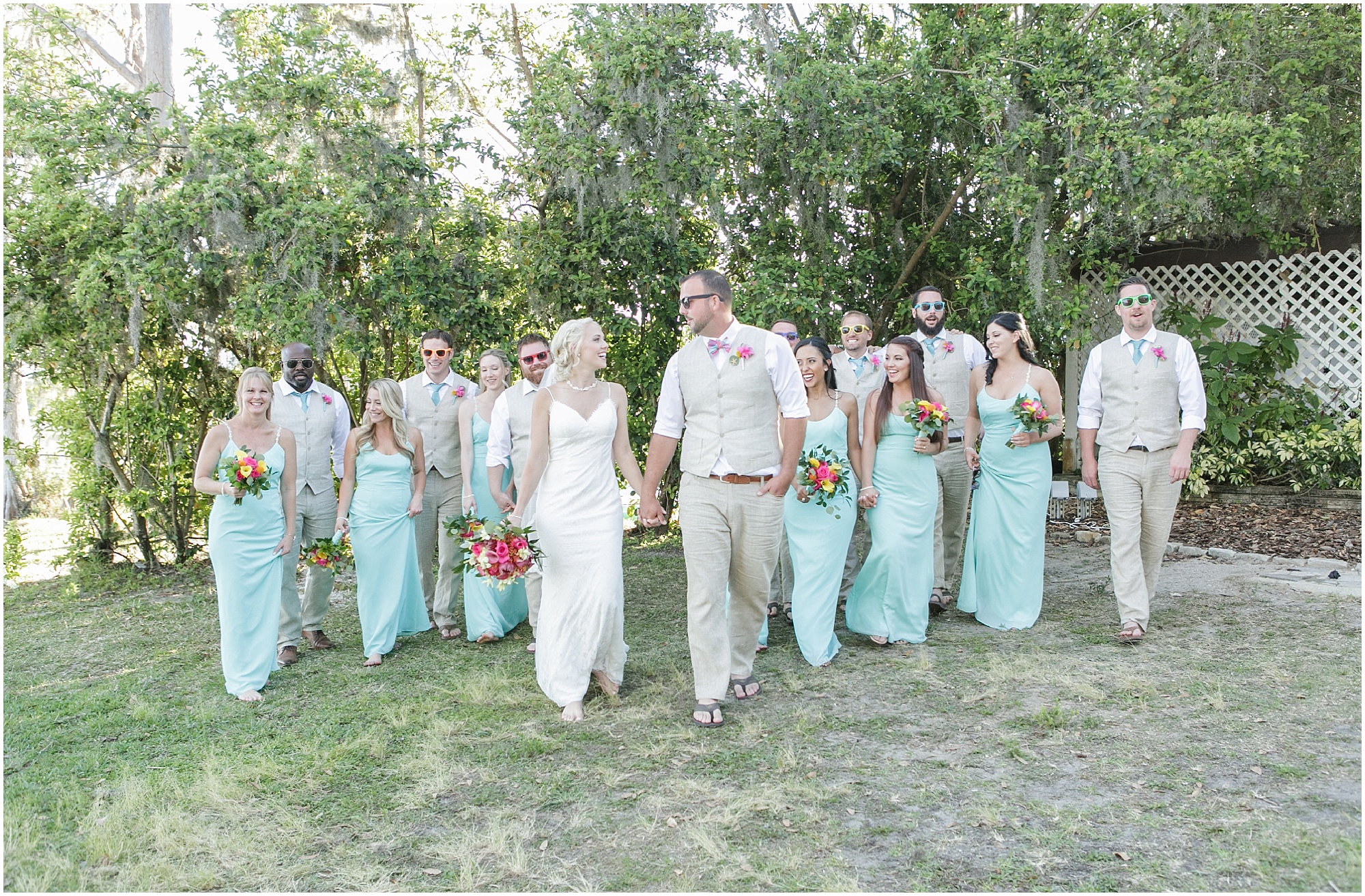 Bride and groom walking their wedding party. 