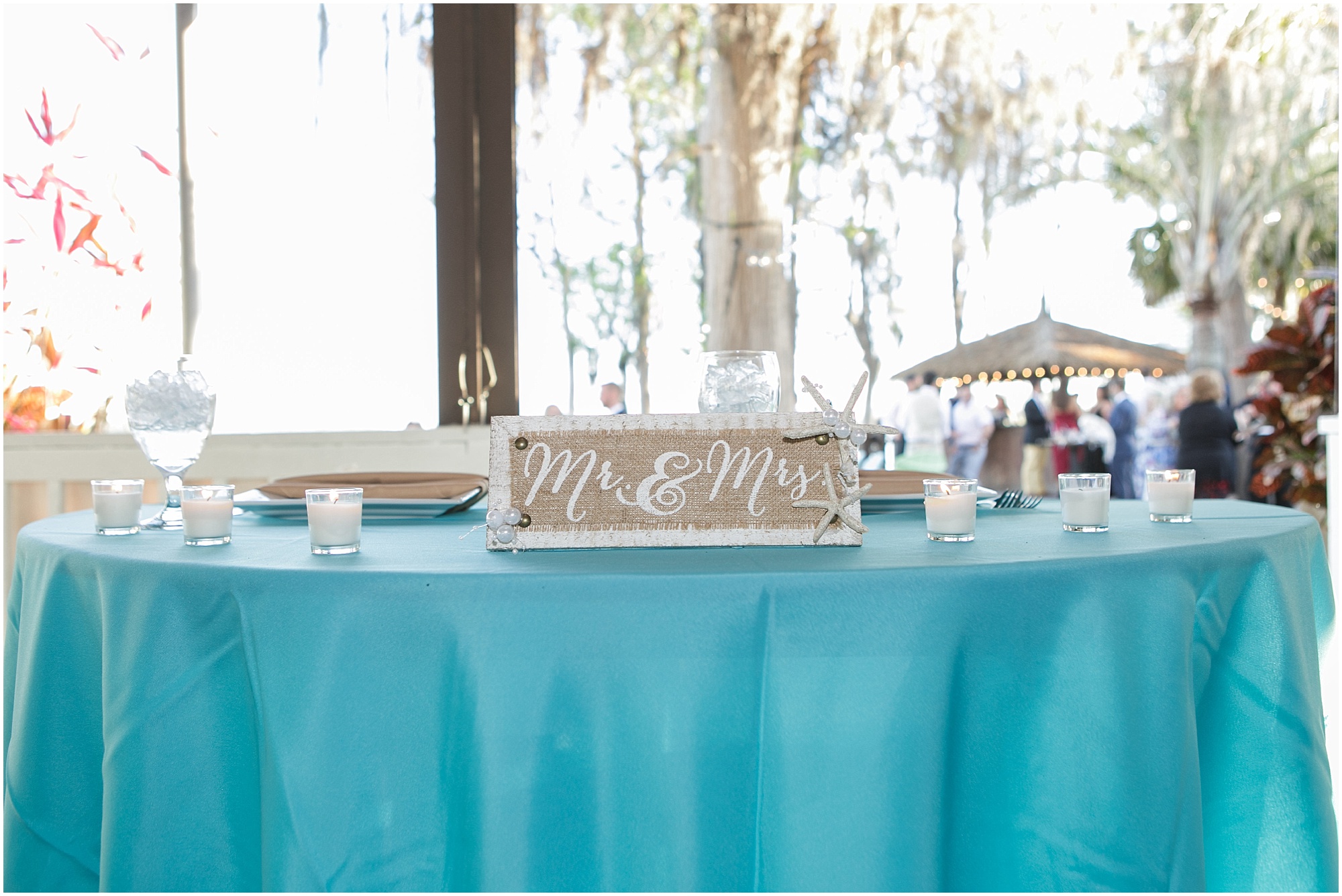 Sweetheart table for paradise bride and groom at their reception. 