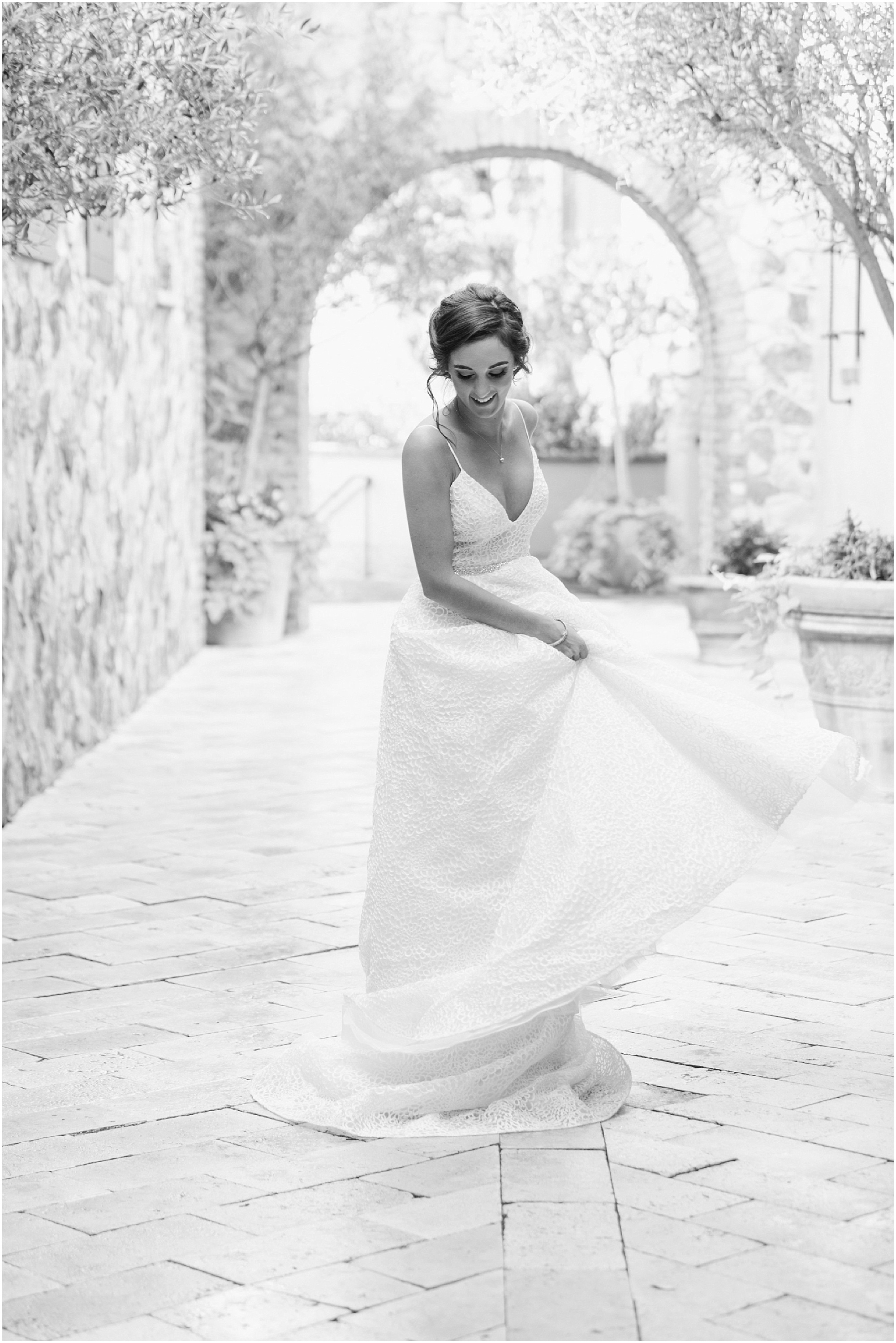 Bride twirling in her wedding dress.