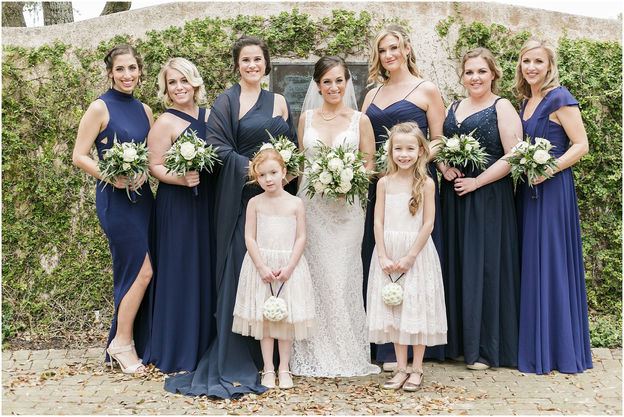 Bride and her entire bridal party dressed in blue.