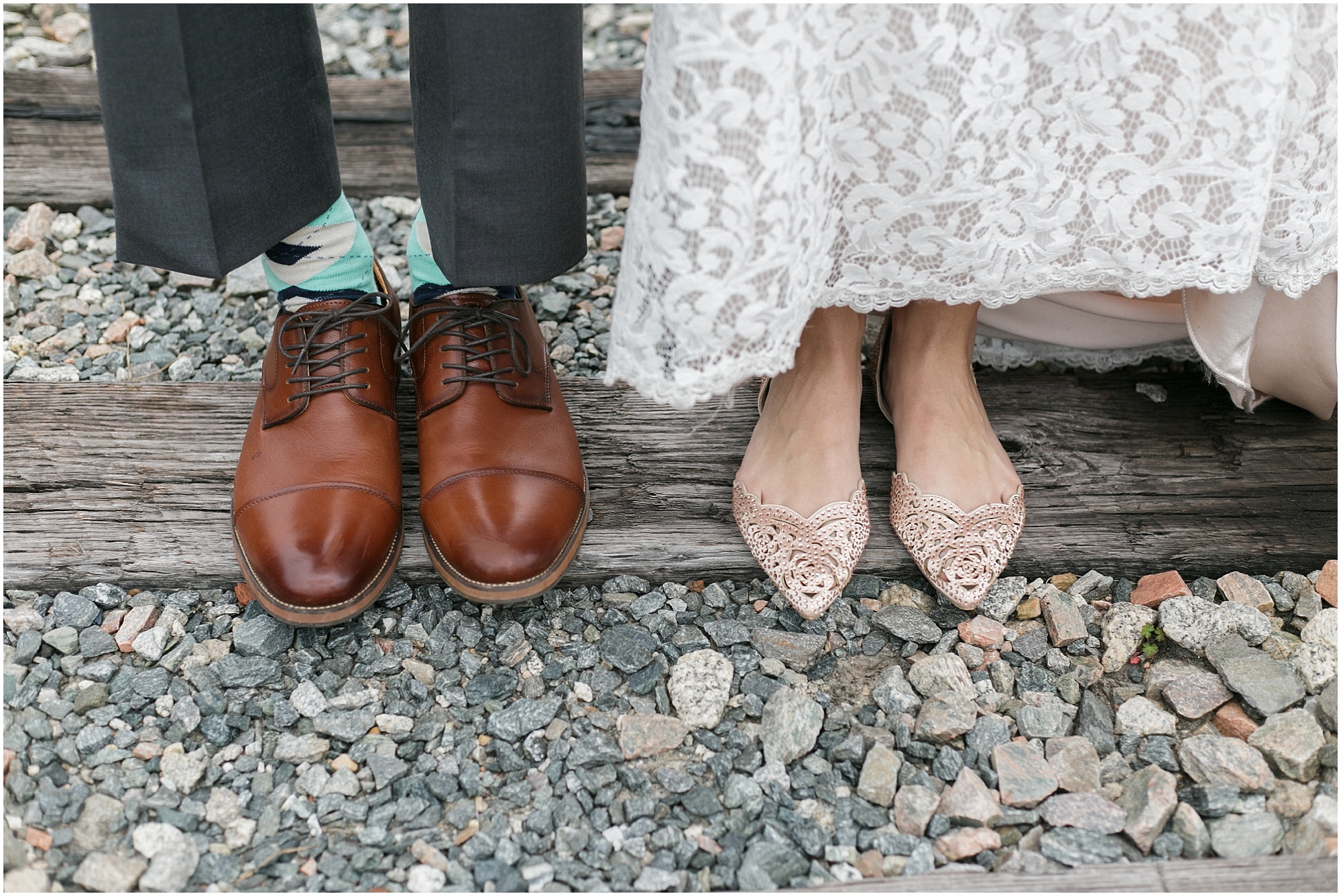 Photo of the bride and grooms shoes.
