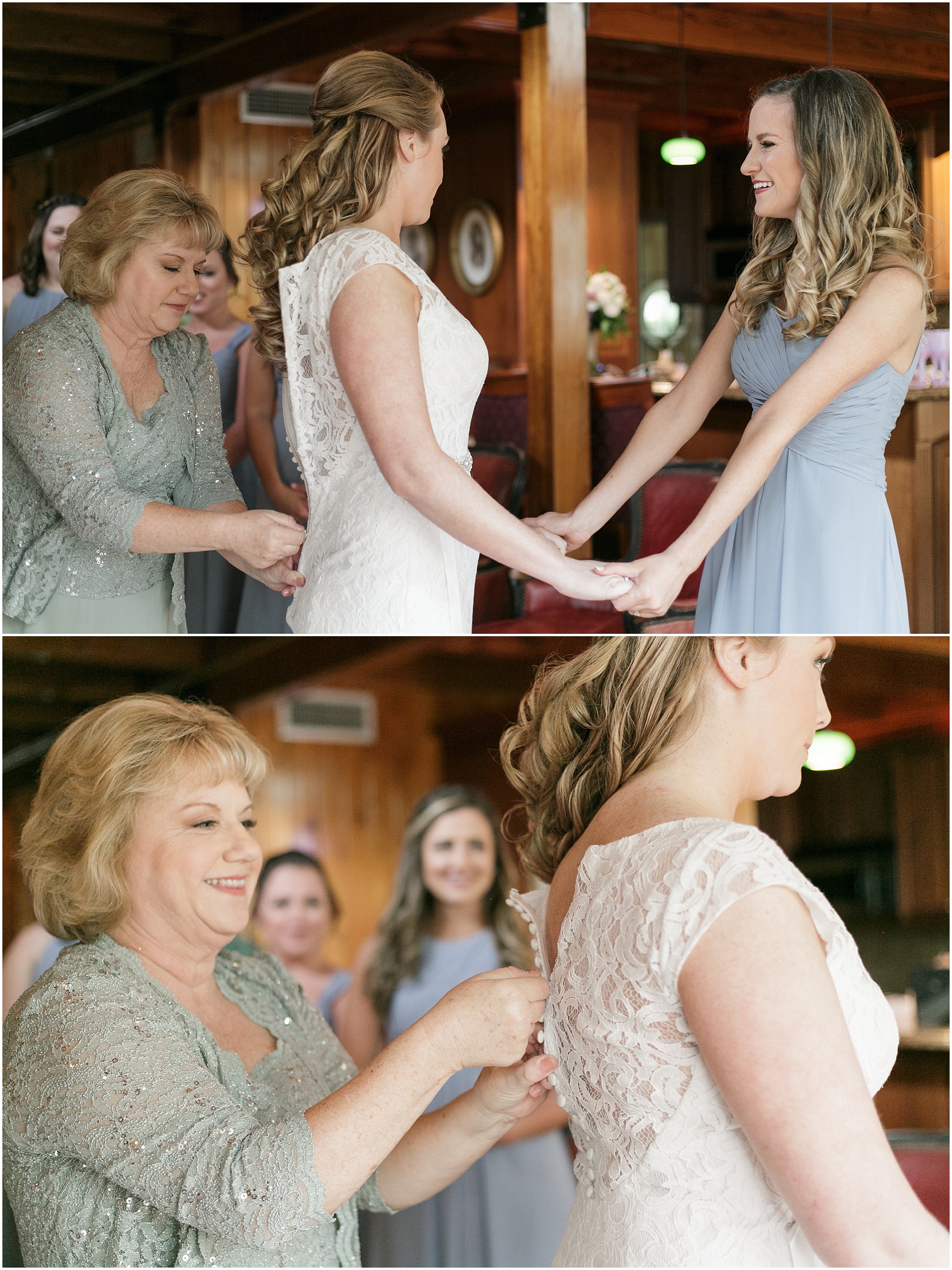 Bride's mother zipping up wedding dress with bride holds her bridesmaids hands.