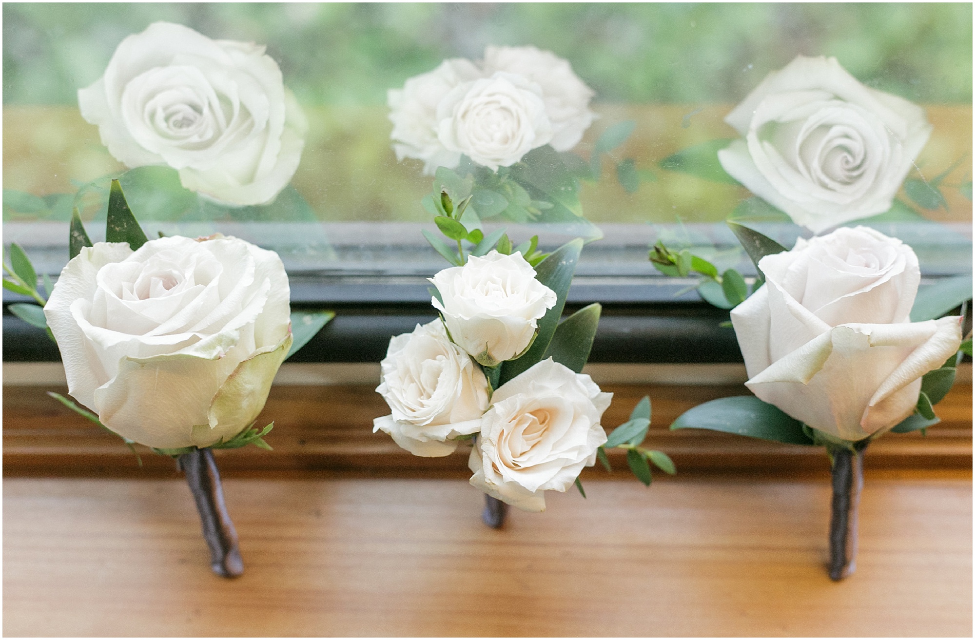 White rose boutonnières for the Estate on the Halifax wedding.