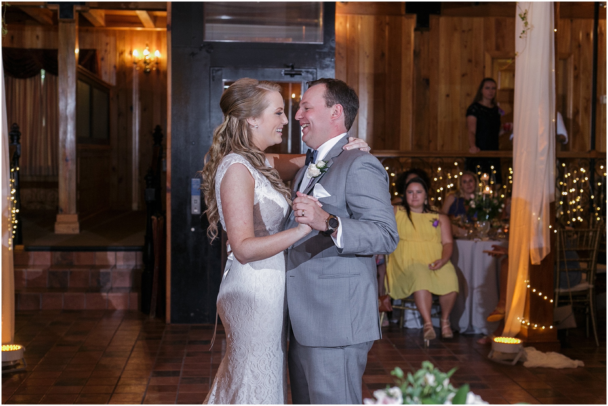 Newlyweds share their first dance as a married couple.