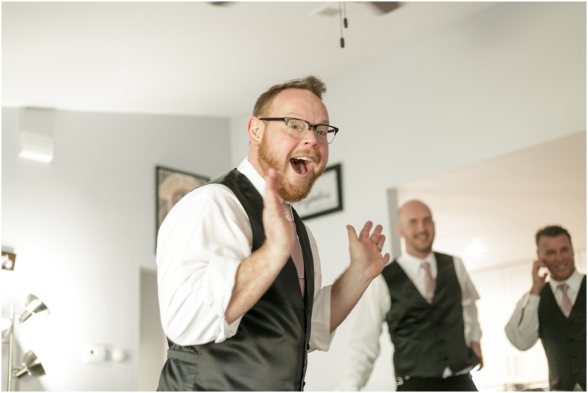 Groomsmen laughing and having fun before the ceremony. 