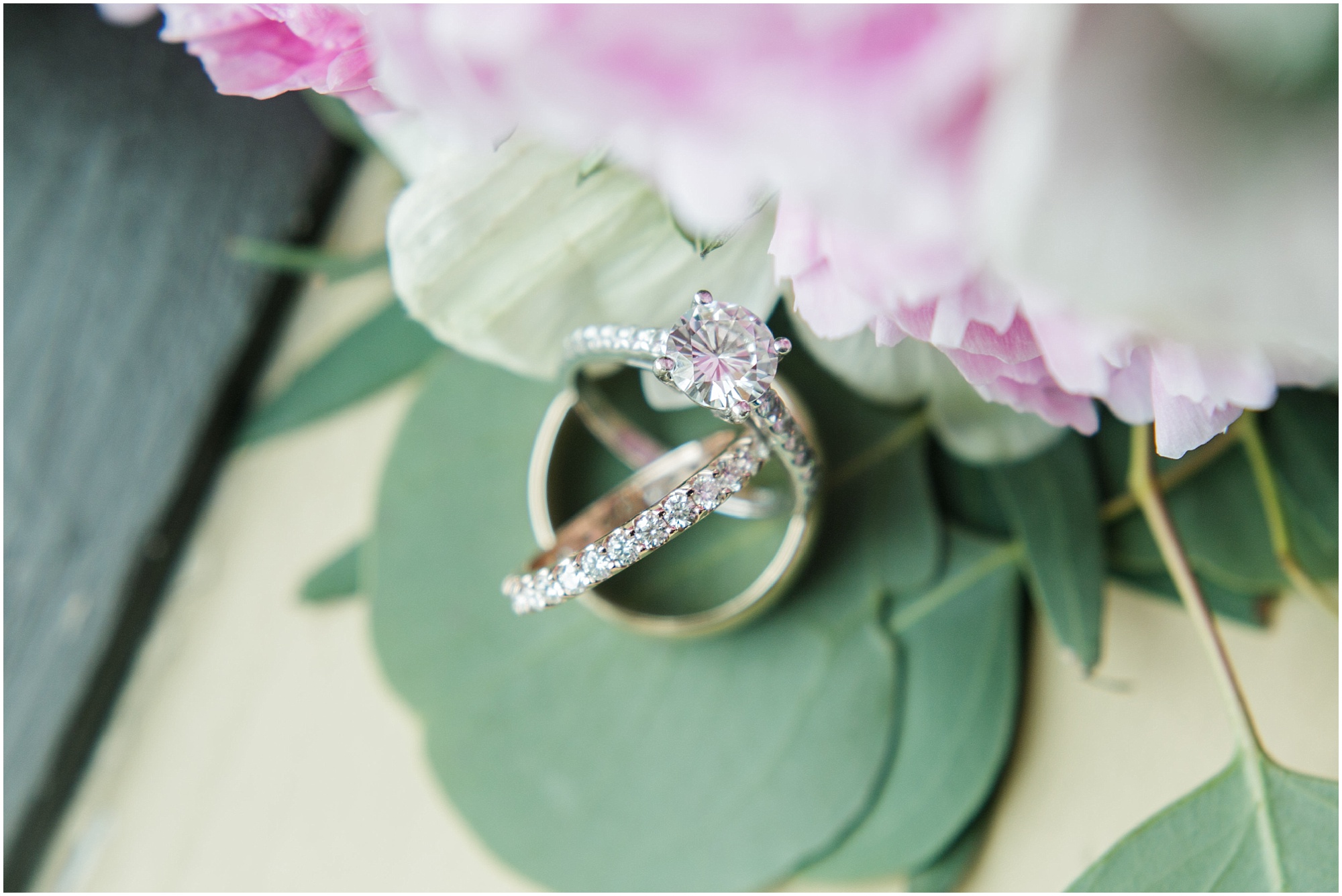 Romantic intimate rooftop wedding bride and groom rings. 