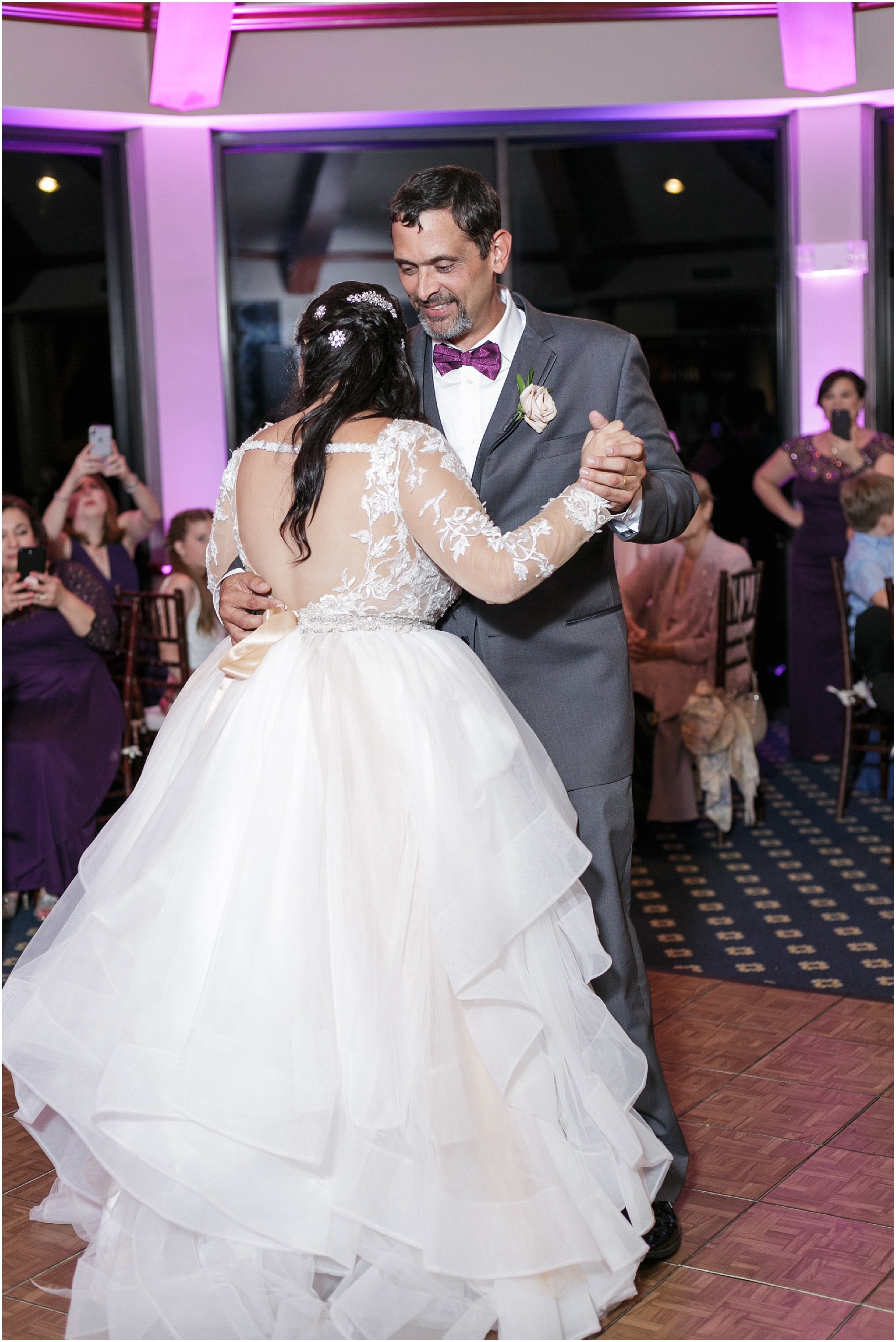 Dad dances with his daughter on her wedding day. 