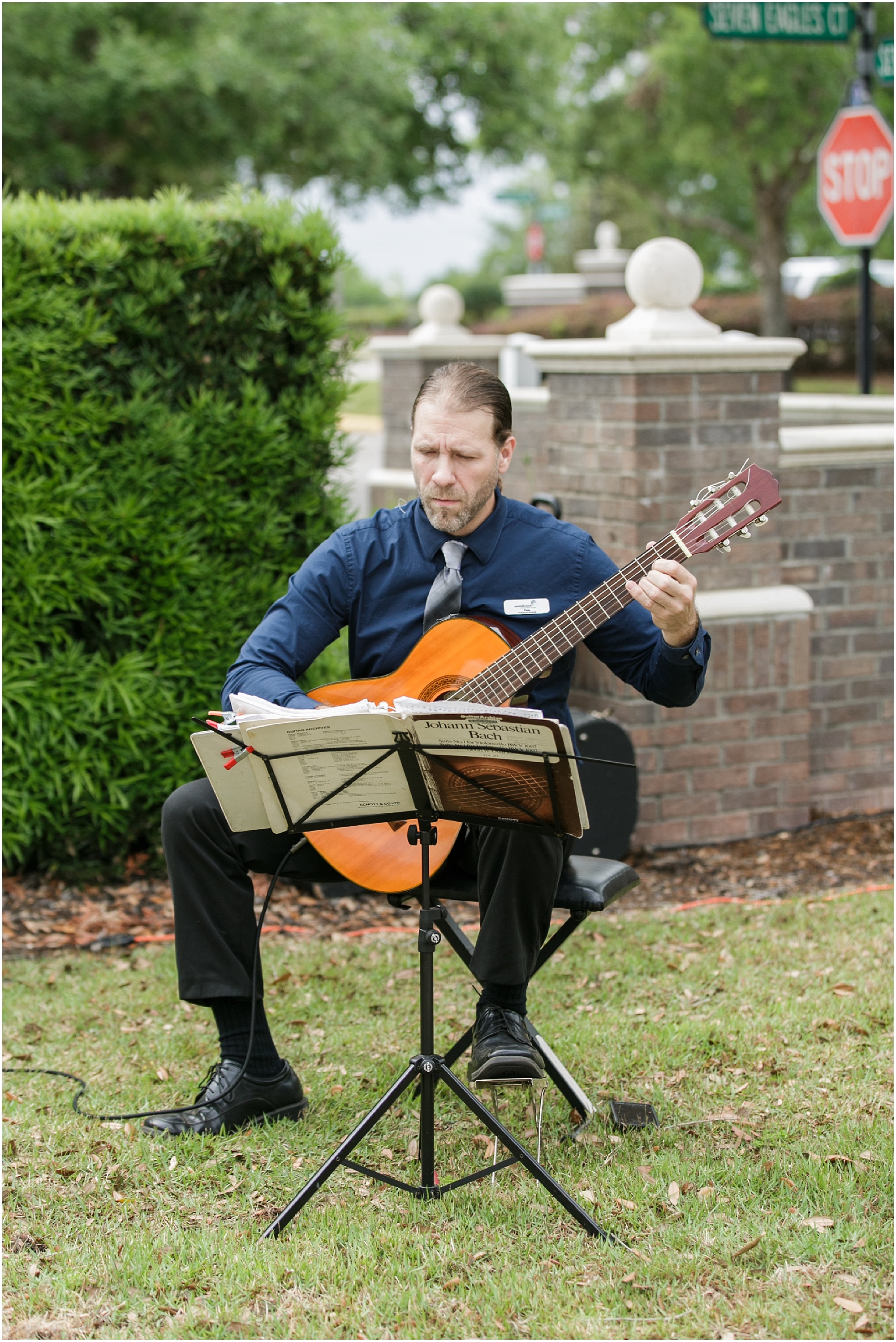 Guitar player playing music during the ceremony. 