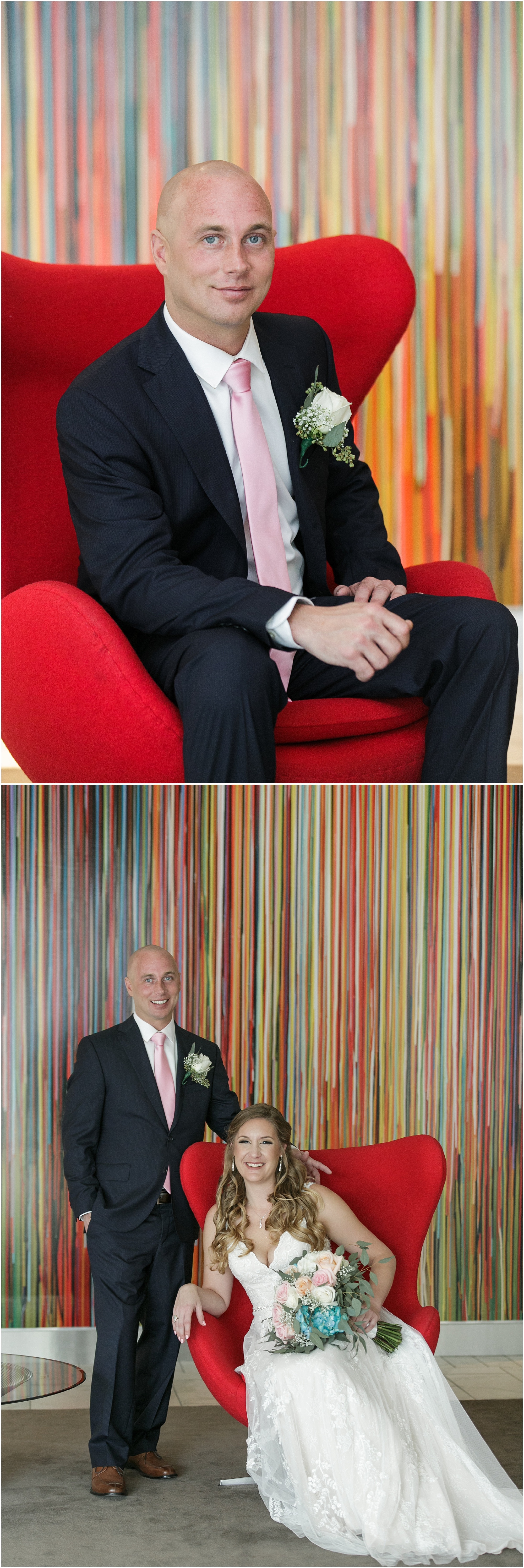 Groom sitting in a red modern chair and then joined by his bride to take photos in front of a colorful striped wall. 