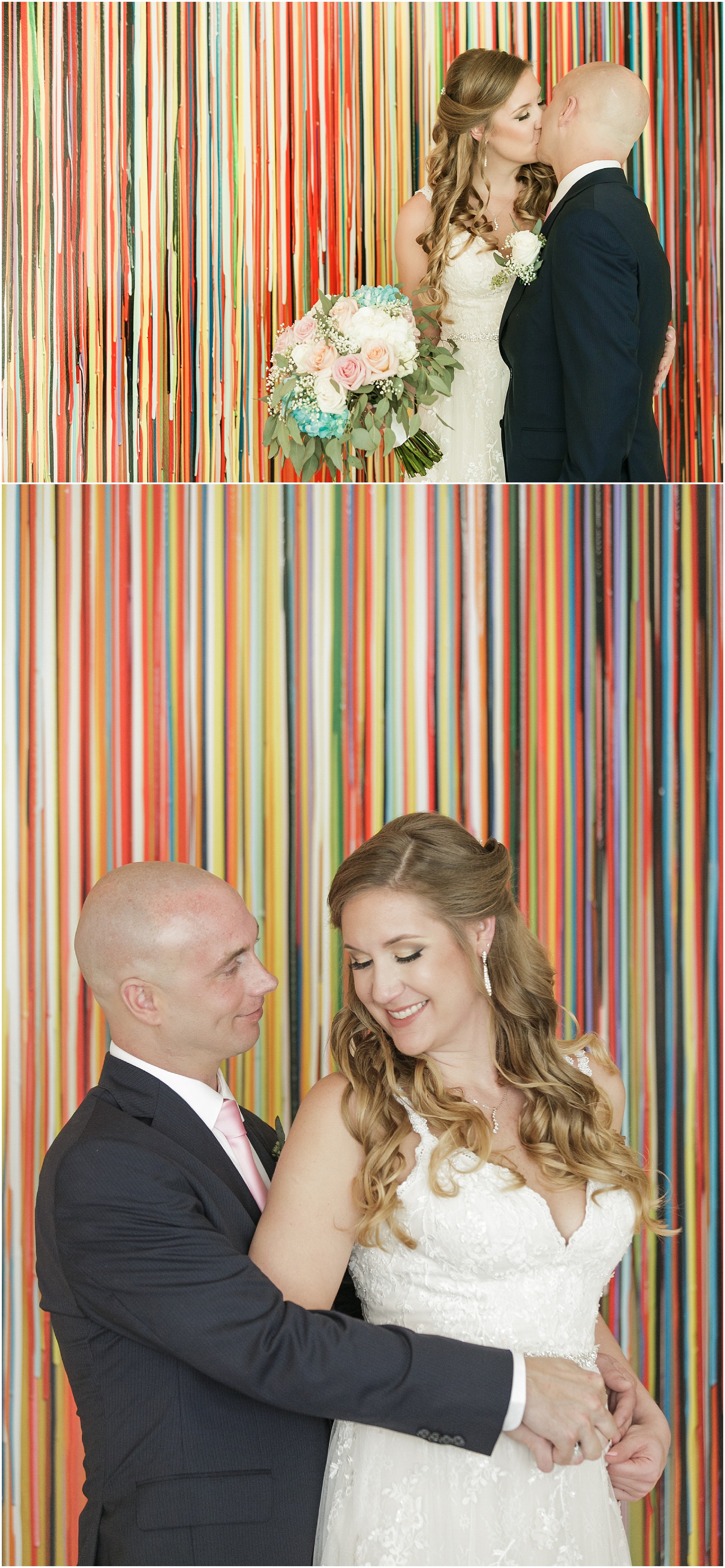 Bride and groom taking photos in front of a colorful striped wall. 