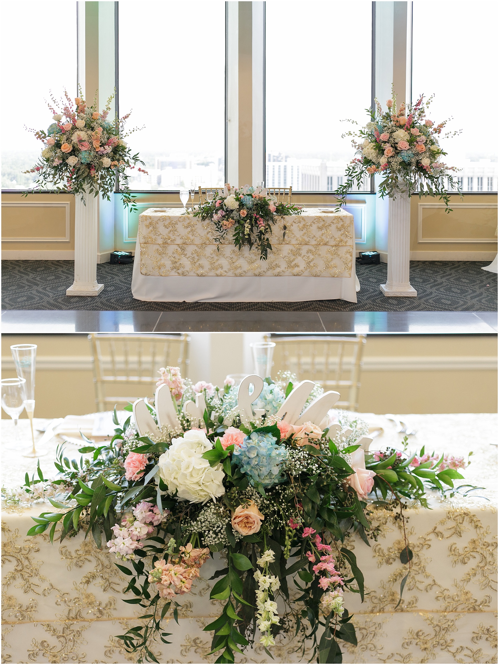 Sweetheart table decorated with florals in shades of pink, blue, and peach. 