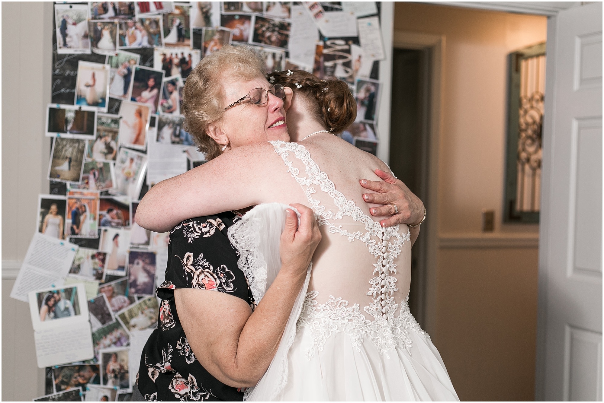 Bride giving her mother a hug