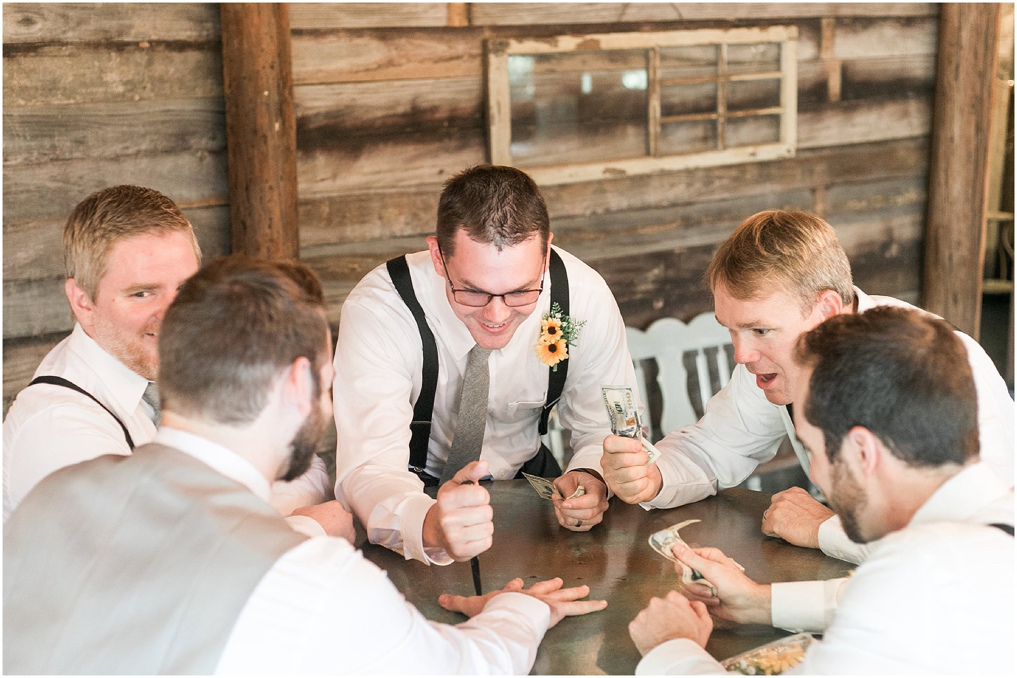 Groom and his groomsmen playing games while waiting for the wedding to begin