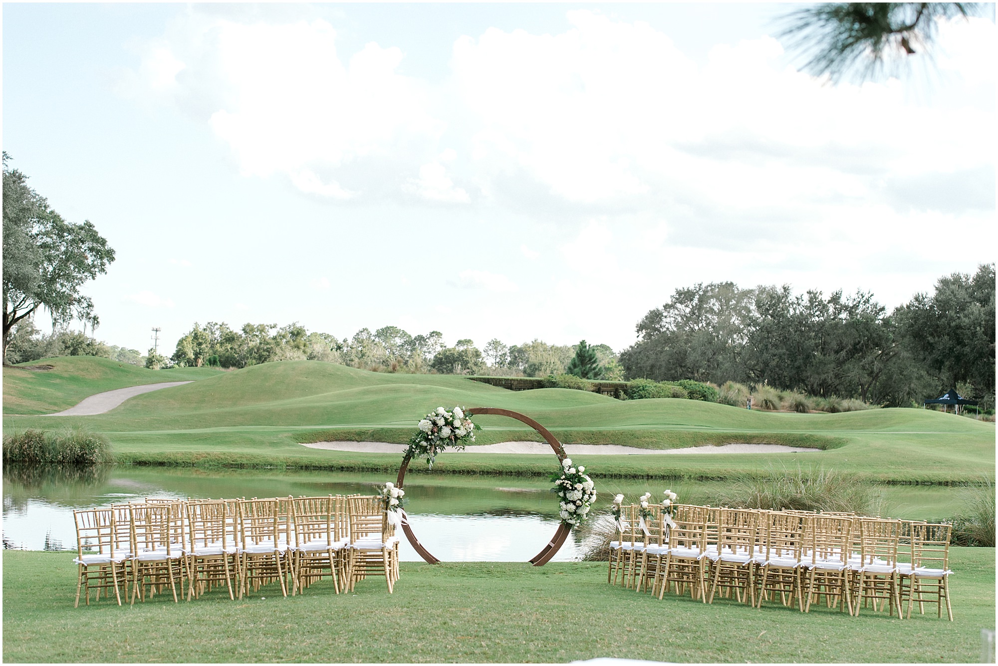 Outdoor ceremony space at the villas of grand cypress overlooking the lake