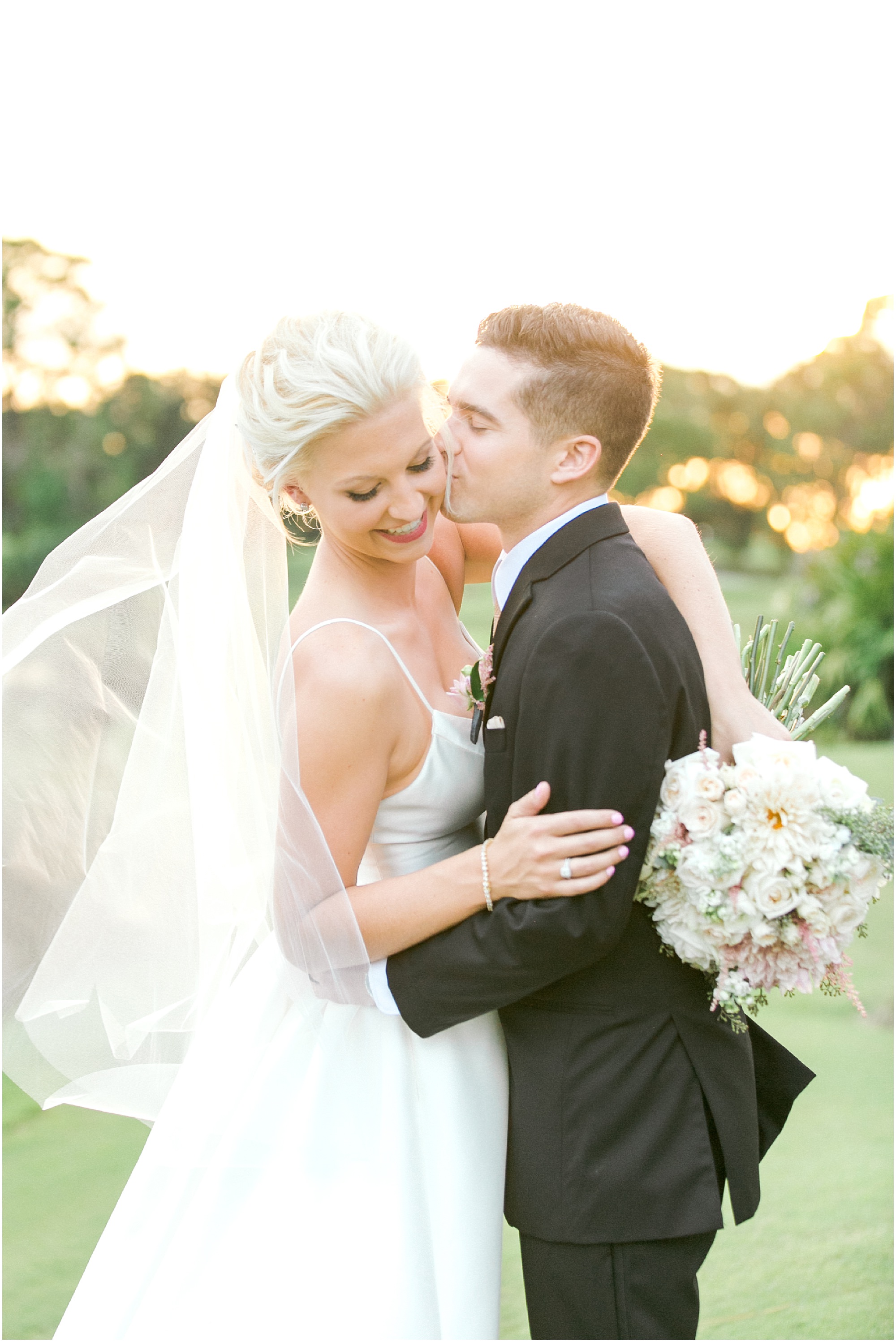 Romantic Wedding at the Villas of Grand Cypress bride and groom taking portraits in the sunset.
