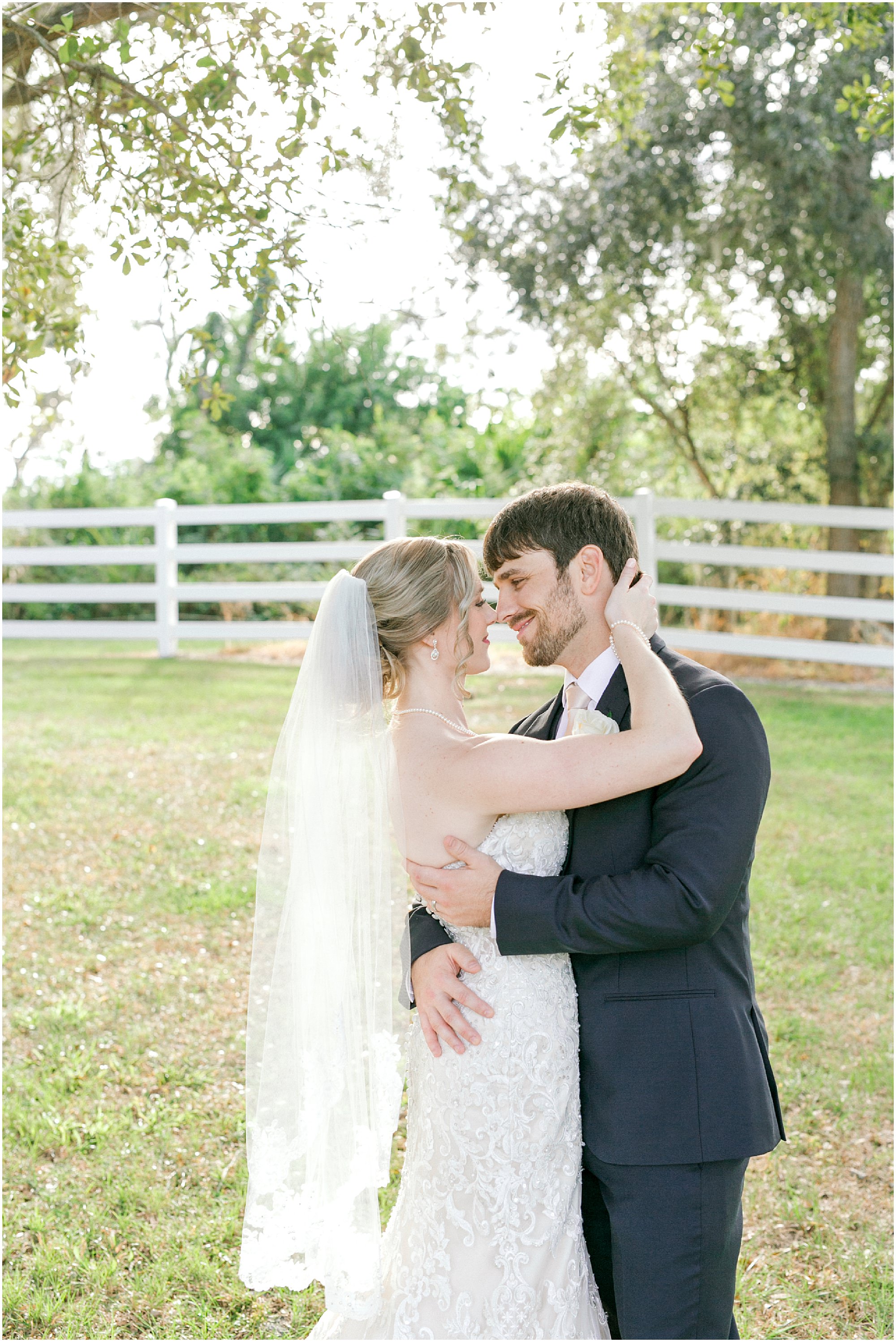 Rustic Glamour Wedding couple holding each other outdoors at Up the Creek Farms