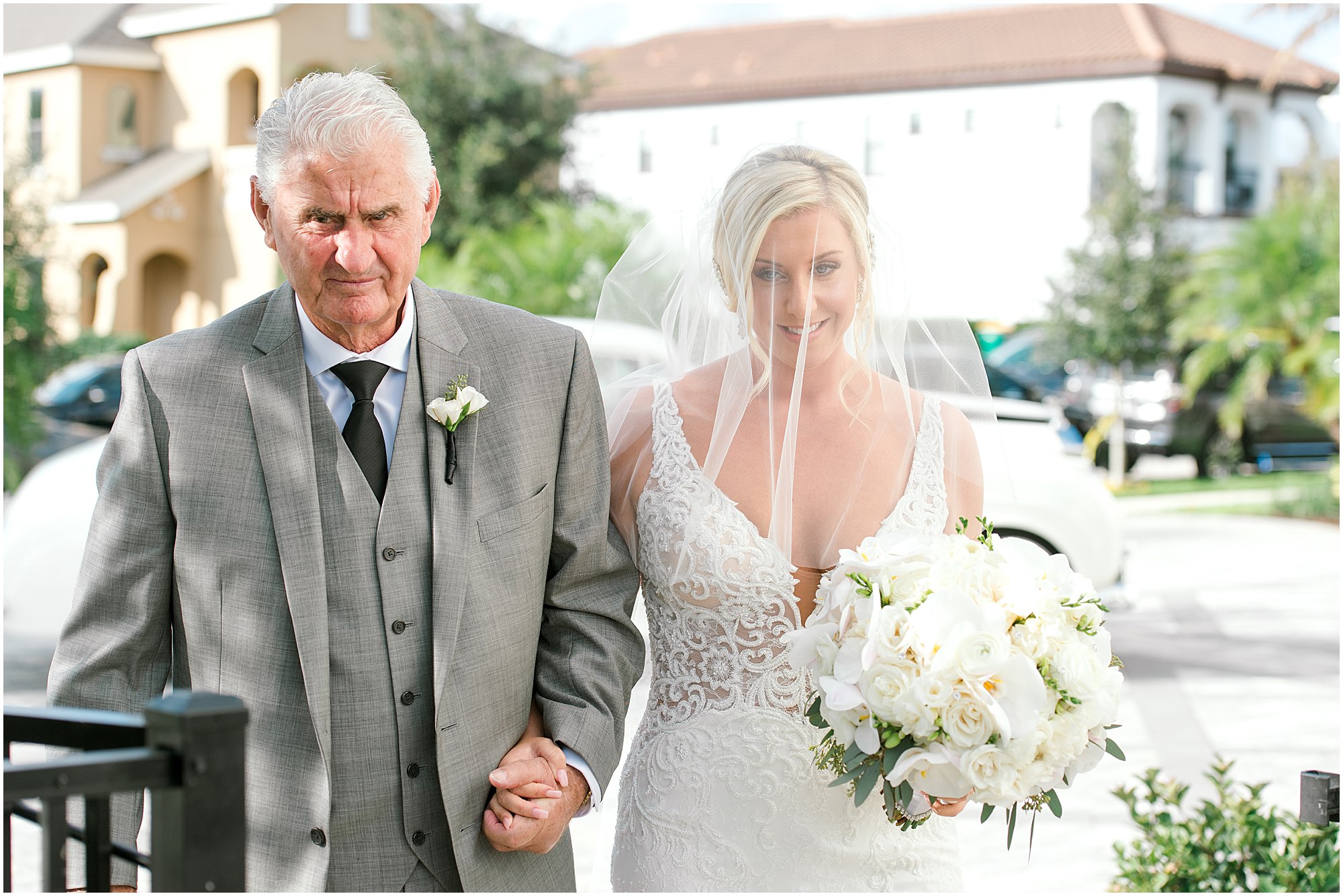 Bride being escorted by her grandfather