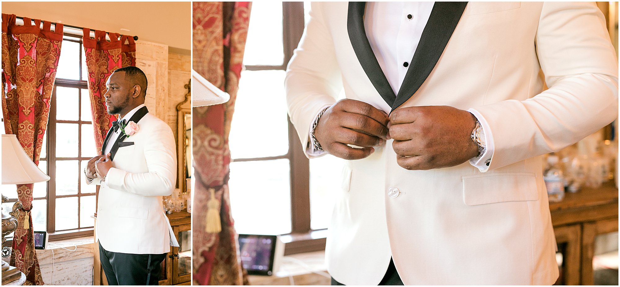 Groom getting into his white suit with black accents