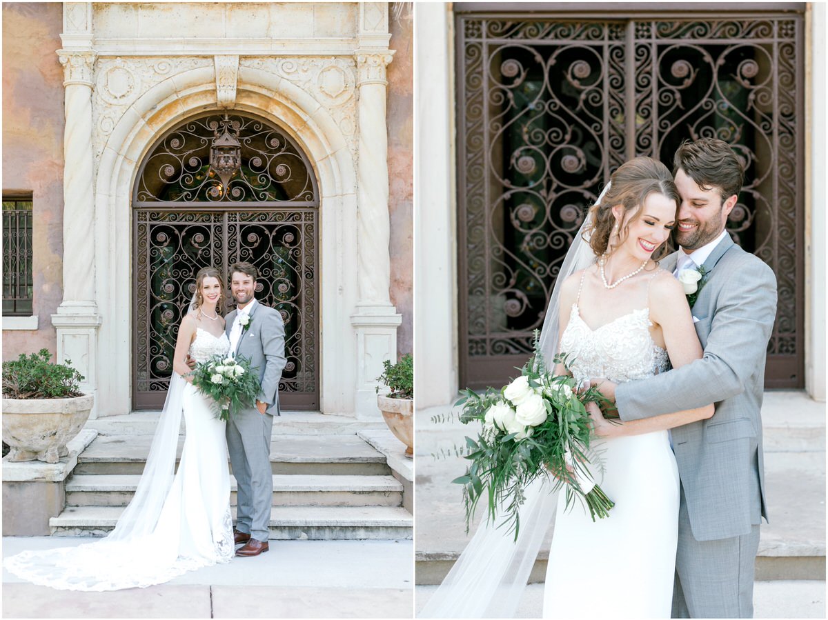 Bride and groom taking photos outside of the iron gates at The Howey Mansion