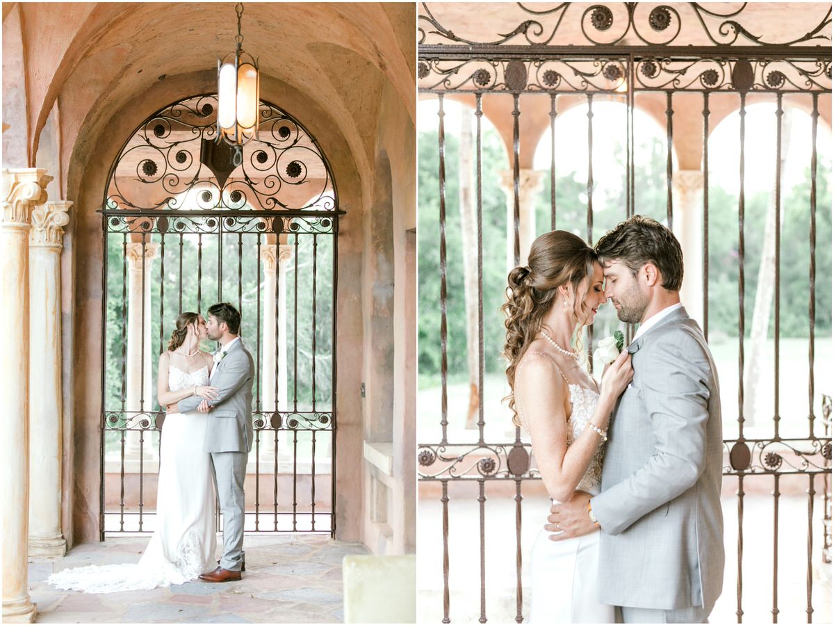 Bride and groom in front of antique iron gates