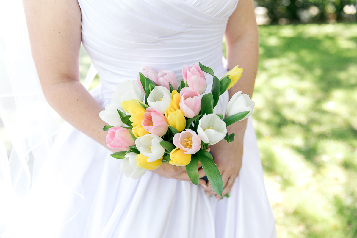 white, pink, yellow tulip wedding bouquet