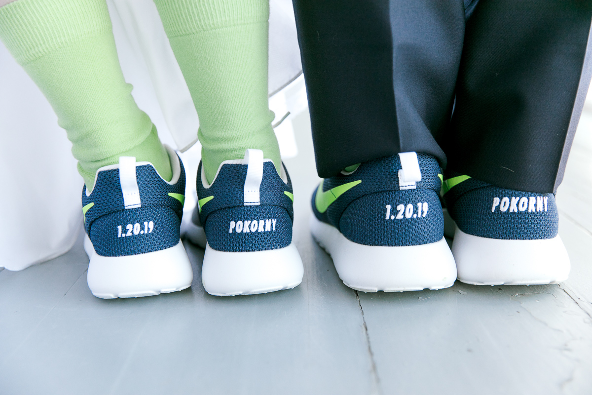 bride and groom in matching wedding sneakers