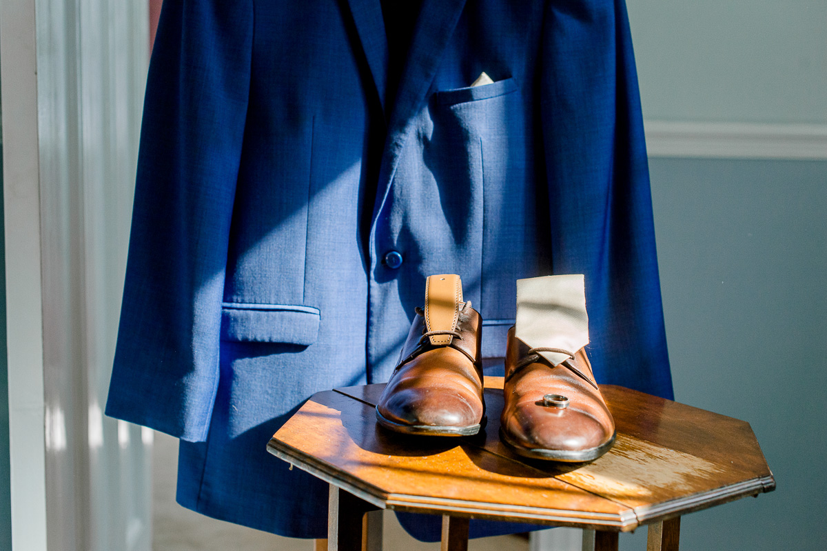 Blue suit and brown shoes