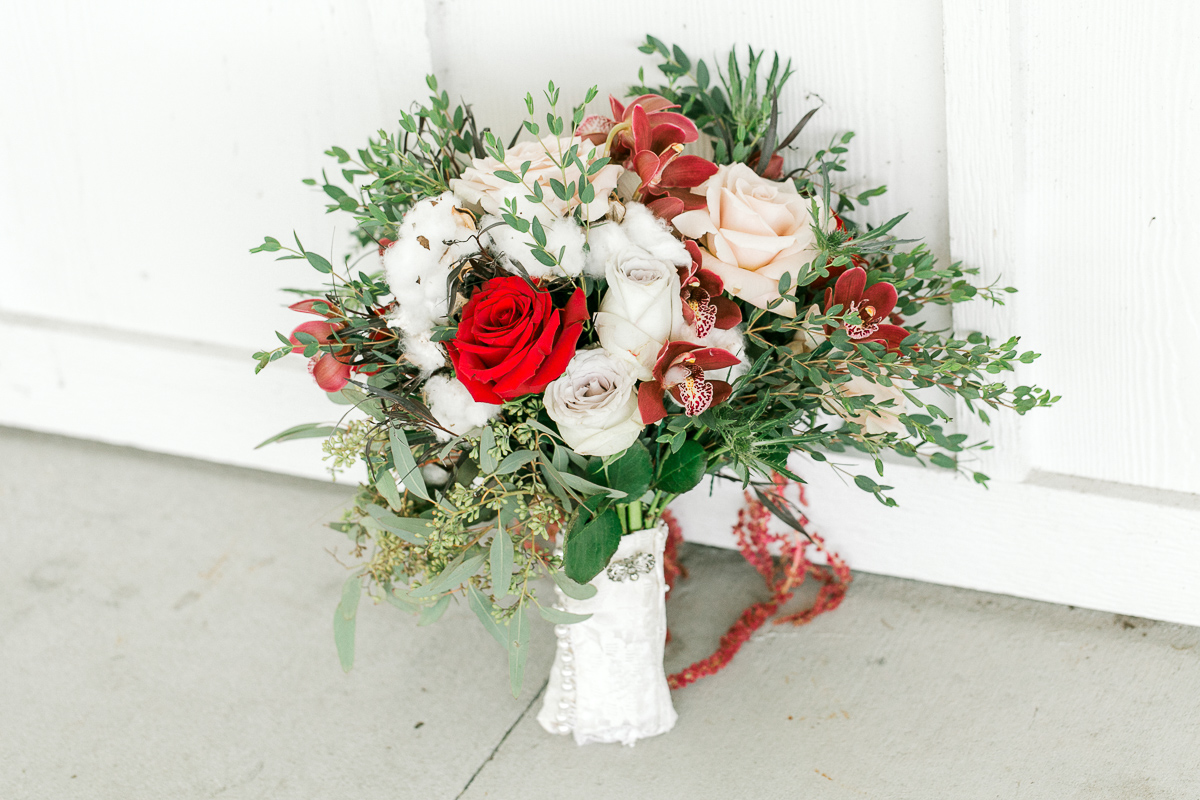 Bridal bouquet with shades of red flowers