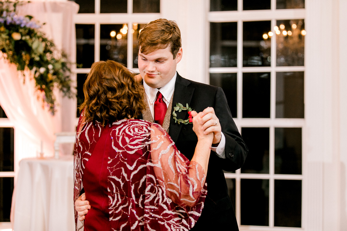 Groom dances with his mom at wedding