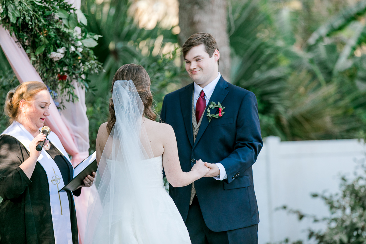 Bride and groom say their wedding vows to each other