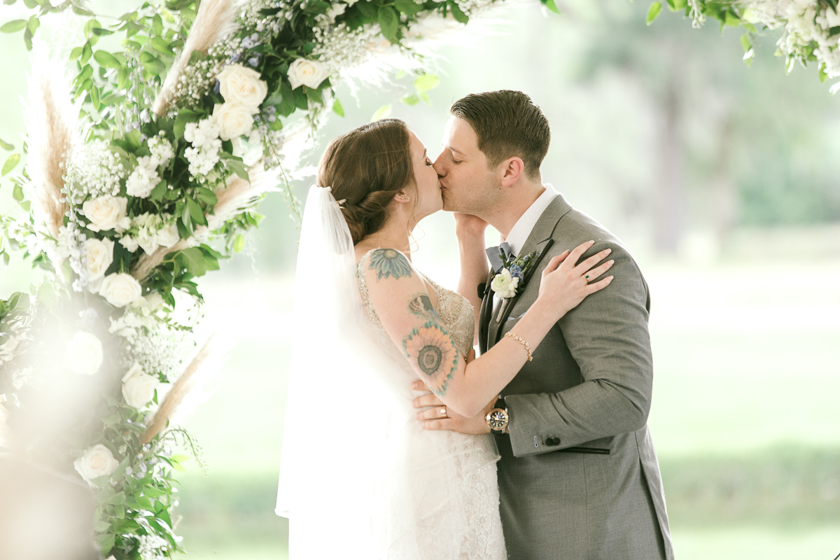 Bride and groom share first kiss as husband and wife